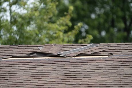 Roof shingles have been damaged by high winds